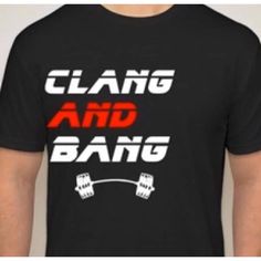 New! Best Seller! Unisex. Clang And Bang Shirt. Perfect For Those Who Like To Lift Heavy Weights! Next Level 60-40 Blend Shirt. Black Shirt With Bright White And Red Font. Super Soft And Comfortable To Wod In. Popular For Crossfit Shirts, Gym Clothes, Or Workout Gear. Latitudegearrx Company Name In White Font On Right Sleeve Hem. Please Note: Font Is "Justified-Right" And Not Centered On Shirt. Black Workout T-shirt With Slogan, Black Branded T-shirt For Gym, Black Branded Gym Tops, Black Branded Tops For Gym, Black Branded Tops For The Gym, Black Slogan Gym Top, Black Slogan Tops For Gym, Black Workout Tops With Branding, Black Branded Tops For Workout