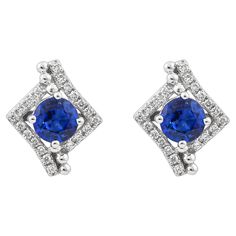 Elevate your jewelry collection with these exquisite blue sapphire earrings, expertly crafted in 18K white gold. Featuring brilliant blue sapphires that exude a deep, rich hue, each stone is beautifully complemented by sparkling diamonds that add a touch of elegance and sophistication. Blue Sapphire Stud Earrings in 18Karat White Gold with Diamond. Blue Sapphire: 1.129 carat round shape, 5mm size, 2 pieces. Diamonds: 0.163 carat, G color, VS clarity. Gold: 2.411g, 18K white gold. E120 Gia Certified Sapphire Diamond Earrings For Formal Occasions, Formal Gia Certified Sapphire Diamond Earrings, Fine Jewelry Sapphire Earrings With Diamond Cut, Elegant Blue Gia Certified Diamond Earrings, Sapphire Diamond-cut Earrings, Blue Sapphire Diamond Earrings As Gift, Gift Blue Sapphire Diamond Earrings, Blue Diamond Gemstone Earrings For Anniversary, Formal White Gold Sapphire Diamond Earrings