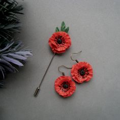 "Bright floral earrings with Red Poppy Flowers. These poppy earrings are dainty, detailed, and perfect for cooler months! Each flower is unique, because it is made by hand. The stamens are also painted by hand with acrylic paints. No mold Used! The Flowers of polymer clay are waterproof. Rememorial Day Flower Free shipping! Ready to ship! Approx diameter 1\" Real colors may slightly differ from one monitor to another, as it depends on specific monitor settings. Browse around my entire shop here Red Handmade Flower Earrings, Red Flower Earrings For Wedding, Handmade Flower-shaped Red Earrings, Red Flower-shaped Earrings With Handmade Flowers, Poppy Earrings, Wildflowers Wedding, Poppy Pins, Gift For Artist, Mother's Day Jewelry