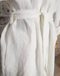 White linen bath robe.This wrap style linen bath robe is made of stonewashed middle weight highest quality soft 100% linen.Lightweight kimono style robe is with pockets and has adjustable ties for best fitting.Composition: 100% natural softened 200gsm 7oz linenPlease choose a size and length :Back length:short - 90cm (35") middle - 105cm (41") long - 120cm (47") Sleeve length from neckline 73cm (29")XS-M or L-XLIf you need other size, please contact us.Linen care:- washing up to 40°C in washing Linen Long Sleeve Robe For Daywear, Long Sleeve Linen Robe For Daywear, Relaxed Fit Linen Robe For Daywear, Long Linen Robe For Spring, Long Sleeve Linen Beach Robe, Elegant Linen Summer Robe, Beige Linen Robe For Spring, Beige Linen Spring Robe, Spring Beige Linen Robe