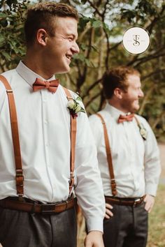 two men wearing suspenders and bow ties are standing in front of each other, one is throwing a frisbee into the air