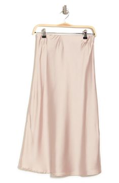 Elevate your wardrobe with this pull-on bias satin midi skirt for elegant, feminine style. 31" length (size S) Elasticized waist Pull-on style Satin construction 97% polyester, 3% spandex Machine wash cold, line dry Made in USA Model’s stats for sizing: 5’10” height, 34” bust, 27” waist, 35” hips. Model is wearing size S. Feminine Satin Lined Skirt, Spring Relaxed Bias Cut Maxi Skirt, Spring Bias Cut Relaxed Maxi Skirt, Spring Relaxed Fit Bias Cut Maxi Skirt, Stretch Satin Midi Skirt, Satin Stretch Midi Skirt, Feminine Silk Maxi Skirt, Summer Satin Bias Cut Skirt, Summer Satin Skirt With Bias Cut