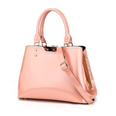 Imported Material:This women's satchel handbag is made of synthetic patent vegan leather. The detachable long shoulder strap makes it easier to be used as a crossbody or shoulder bag. Dimension:Patent Bag Size: 11.4"Wx8.6"Hx 5.5"D, not too small or too big for daily use, Handle Drop: 7", Crossbody Strap: 24". This shoulder bag has a large capacity will keep your Ipad, magazines, keys, umbrella, wallet, sunglasses, phone, lipstick, and cosmetics organizer Feature:Double handles and detachable lon Nana Aesthetic, Cosmetics Organizer, Patent Leather Bag, Patent Leather Handbags, Over The Shoulder Bags, Rhinestone Trim, Pink Purse, Satchel Handbags, Crossbody Strap