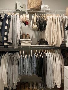 a closet filled with lots of clothes and shoes