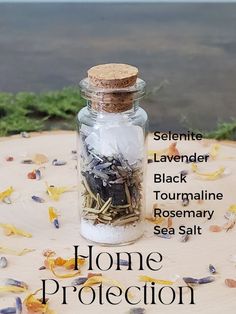 A blend of intentional herbs and crystals creates this home protection spell jar Mason Jar Fireflies, Witch Bottle Spells, Spell Jar For Protection, Happy Home Spell Jar, Mini Spell Jars Diy, Protection Spell Jar Recipes, Witch Jars Spells, Diy Spell Jars, Creativity Spell Jar