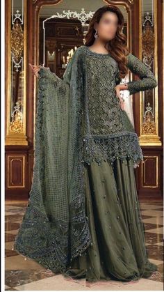 *Brand Name*     *MARIA B * *ORGANZA/NET*       *FABRIC DETAILS *  (SHIRT) ...ORGANZA (DUPATTA)ORGANZA (TROUSER) MALAI & NET *EMBROIDERY DETAILS* *FRONT*  EMBROIDERED *with stones handwork & cutwork* *NECK*  EMBROIDERED *with stones handwork* *FRONT*  BORDER EMBROIDERED *with stones handwork* *BACK* EMBROIDERED BACK BORDER EMBROIDERED *SLEEVES* EMBROIDERED SLEEVES BORDER EMBROIDERED *DUPATTA * EMBROIDERED *with 4 side embroidered border* *GHAGRA*  EMBROIDERED  *BEST QUALITY IS OUR TOP PRIORITY* The model picture is only for reference you will get the dress as shown in unstitch pic. This dress will be make to order according to your size (your given measurements) and will be ready to ship in 4 to 5 weeks. Green A-line Wedding Dress, Festive A-line Wedding Dress, Festive A-line Evening Dress For Wedding, Long Sleeve Dressy Wedding Gown, Glamorous Dress With Dupatta, Festive A-line Wedding Gown, Semi-stitched Dresses For Wedding And Festive Occasions, Formal Green Semi-stitched Sharara, Traditional A-line Party Dress