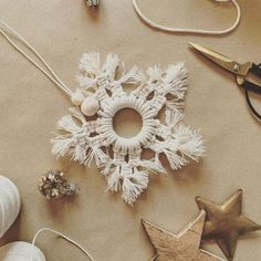 various items are laid out on the table to be used as ornaments for christmas tree decorations