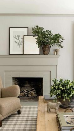 the living room is clean and ready for us to use it's fireplace as a focal point