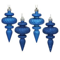 four blue candlesticks are lined up against a white background