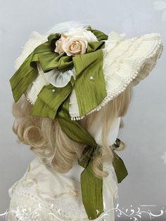 Add a touch of whimsical charm to your outfit with our delightful straw bonnet. Available in a range of colors including blue, green, beige, and pink, each bonnet features delicate flower details that capture the essence of cottagecore style. This versatile accessory is perfect for completing a sweet and romantic look.   Please note that the product includes only the straw bonnet. Elegant Adjustable Bonnet For Summer, Elegant Adjustable Summer Bonnet, Elegant Cream Bonnet For Spring, Elegant Adjustable Cream Bonnet, Spring Beige Hat With Ribbon, Elegant Bonnet For Spring, Elegant Spring Bonnet, Adjustable Wedding Bonnet For Spring, Vintage Green Mini Hats For Spring