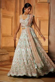 Nitika Gujral-Sage Green Tulle Lehenga Set-INDIASPOPUP.COM Sage Green And Pink Lehenga, Sage Green Mehndi Outfit, Sage Lengha, Sage Green Wedding Dress For Bride, Sage Green Indian Outfit, Sage Green Lengha, Family Wedding Outfits, Pink And Green Lehenga, Crystal Lehenga