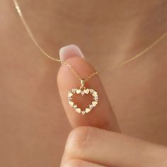 14k Gold Tiny Heart NecklaceDetails Available in 14k Gold, 14k Rose Gold, and 14k White GoldTotal Weight: 2.9 GrColor Selection: Yellow, Rose, WhiteChain: 14k Gold and 45 cm (18 inches) *Model in the photo wears 18 inches (45 cm) chain.GiftingEach design will arrive artfully presented in our branded gift boxes wrapped in a signature ribbon. Production & Delivery Production: 5 - 7 business days Delivery: 1 - 3 business days worldwide via Express Delivery We’re here to help with style advice, a se