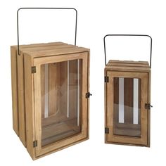 two wooden boxes with metal handles and glass doors