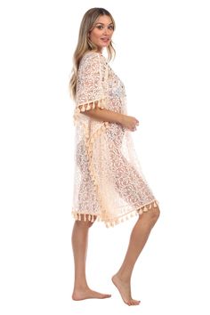 Lace Crochet Kaftan Cover Up Wholesale by La Moda. This cover up is made of lace, crochet trim and v-neck is the perfect accessory to highlight life's most precious moments. Holidays are made for relaxing by the pool, lounging with friends at the beach, or adventures that take you somewhere you'll never forget Crochet Lace Cover-up For Vacation, V-neck Crochet Lace Dress For Beach Cover-up, Bohemian Crochet Lace For Spring, Spring Bohemian Crochet Lace, Beige V-neck Crochet Beach Dress, V-neck Crochet Lace Dress For Vacation, Bohemian Summer Lace With Lace Patchwork, Bohemian Lace With Lace Patchwork For Summer, Crochet Lace V-neck Dress For Beach Cover-up