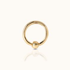 Ball Orbital Seamless Hoop Earring is made of 14K Solid Gold, sold individually for mix and match with your daily outfits. This beautiful hoop is as basic as your other essentials that you can wear it everyday everywhere. It is perfect to wear alone or stack with other earrings. Our Seamless Ring Hoop offers effortless insertion and removal with a simple bending of the metal to open and close the hoop. DETAILS Sold by single Color: 14K Gold Material: 14K Solid Gold Internal Diameter: 8 mm, Exter Forward Helix Earrings, Conch Earring, Flat Back Earrings, Tragus Earrings, Single Earring, Beaded Rings, Bending, Gold Material, Ring Necklace