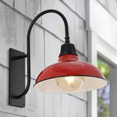 This vintage metal wall light adds a bold curve to a farmhouse porch or shiplap wall. A warm globe LED bulb has a painted shade mounted on an arched bracket. This outdoor light fixture can also be used indoors for residential and hospitality projects. JONATHAN Y Stanley Iron Gooseneck Arm Industrial Vintage 1-Light 17-in H Satin Red LED Outdoor Wall Light | JYL7614E Outdoor Light Fixture, Country Lighting, Outdoor Barn Lighting, Shiplap Wall, Farmhouse Industrial, Metal Wall Light, Black Outdoor Wall Lights, Lighting Plan, Farmhouse Porch