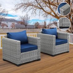 two wicker chairs sitting on top of a wooden deck next to a large tree