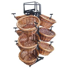 several baskets are stacked on top of each other in the same basket holder for storage