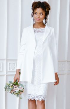 Our Kathleen Bridal Jacket just exudes City Hall Chic….. This lightweight jacket is created with smooth satin stretch crepe to make it easy and comfortable to wear without any compromise on style. The soft collar and hidden button fastening detail add beautifully to the design but if you want to add more, the jacket offers barely there belt loops to allow you add one of our many bridal belts for some sparkle and shine. Feminine Fall Wedding Outerwear, Elegant Fitted Outerwear For Mother Of The Bride, Feminine Fitted Outerwear For Wedding, Feminine Fitted Wedding Outerwear, Feminine Spring Wedding Blazer, Maternity Occasion Dress, Rose Tiffany, Bridal Belts, Tiffany Rose