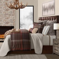 a bedroom with a fireplace and bed in it