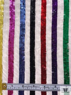 Bring the party with this multicolor and white rainbow striped sequins on silk crepe de chine designer fashion fabric. SKU: 12303 Content: 100% Silk Color: Multicolor / White Width: 44 inches White Rainbow, Silk Crepe, Rainbow Stripes, Fashion Fabric, White Fabrics, Embroidered Friendship Bracelet, Designer Fashion, Rainbow, Silk