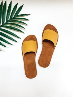 These adorable sandals are the perfect staple shoe! They include a single strap that is yellow and a comfy sole. The heel measures 0.75 inches tall. These sandals fit true to size. SKU: #Efron-S-Yellow Staple Shoes, Giddy Up Glamour, Cute Sandals, Slide On, Slip On Sandal, Sale Items, Sandals, Yellow