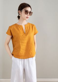 This yellow short sleeve linen top is made of 100% natural linen fabric. It's comfortable and lightweight, making it perfect for wearing in hot weather. The bright color of the top makes it a perfect match for spring and summer. DETAILS * 100% linen tops * Loose fit tops * Short sleeve tops * Summer linen top * Wash by hand or machine with cold water, Ironing after dry   * The model is 168cm (5′ 6″) tall with a 80cm (31.5") bust, 66cm (26") waist. She is wearing a XS. * Choose CUSTOM Order if yo Linen Tops Women Casual, Yellow Linen Shirt, Plus Size Linen, Summer Details, Linen Tops, Linen Top Women, Natural Linen Fabric, Yellow Short, Wool Clothing