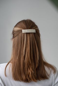 Paris Hair Clip in Pearl | premium French barrette from cellulose acetate, mother's day gift, hair accessories, travel size | gift for girlfriend Length: 3,15'' / 8 cm Hair barrette has high quality metal clip, does not break.  Italian cellulose acetate is completely sustainable and non-allergenic material. ❤️ perfect mothers day gift All the items are handmade. It is the great alternative to jewelry made of plastic and materials of animal origin. Make your choice towards nature. ❤️ YOU WANT 21% OFF https://www.etsy.com/shop/NINIcoJewelry?coupon=2IS21 YOU MUST BUY 2 ITEMS ❤️❤️  YOU WANT 35% OFF https://www.etsy.com/shop/NINIcoJewelry?coupon=35FORYOU YOU MUST BUY 3 ITEMS ❤️ ❤️ ❤️ YOU WANT 41% OFF https://www.etsy.com/shop/NINIcoJewelry?coupon=4IS41 YOU MUST BUY 4 ITEMS ❤️❤️ ❤️ ❤️  YOU WANT Barettes Hairstyles, Hair Pinned Back, Ponytail Scrunchie, Boho Chic Hairstyles, Paris Hair, Hair Accessories Pins, Make Your Choice, Mother Day Gift, Beautiful Shorts