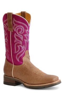 Check out this great looking pair of boots by Roper! This is a great riding/barn boot or just a nice everyday square toe boot for rocking with your favorite jeans. Square Toe Burnish Tan Leather Vamp Embroidered Pink Leather 11" Shaft Double ¾ Welt Sole With Nails Walking Heel Rest Removeable Insole All Leather Lining Handcrafted Boot GEO Outsole 11” Shaft Height 15" Circumference of calf Measurements for this boot were taken from a size 8. Please note that measurements may vary by size. Western Riding Boots Womens, Western Style Square Toe Boots For Western-themed Events, Square Toe Boots For Ranch In Fall, Country Style Fitted Boots With Square Toe, Country Style Fitted Square Toe Boots, Pink Round Toe Ranch Boots, Pink Round Toe Boots For Ranch, Western Moto Boots With Square Toe And Reinforced Heel, Western Moto Boots With Reinforced Heel And Square Toe