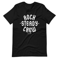 Introducing the Rock Steady Crew T-Shirt, the ultimate addition to any hip-hop enthusiast's wardrobe! Made with high-quality materials and designed with the iconic Rock Steady Crew name, this t-shirt is the perfect way to show off your love for the legendary b-boy crew. Crafted from soft and breathable cotton, the Rock Steady Crew T-Shirt is comfortable to wear and allows for easy movement, making it perfect for dancing, performing, or just hanging out. The shirt is available in a range of sizes Unisex Rock And Roll T-shirt For Streetwear, Black Cotton Rock And Roll T-shirt, Relaxed Fit T-shirt For Music Festivals Fan Merchandise, Crew Neck T-shirt With Text Print For Concert, Relaxed Fit T-shirt With Text Print For Music Festivals, Band Merch Crew T-shirt For Streetwear, Hip Hop Style T-shirt With Letter Print For Fans, Graphic Tee With Band Logo And Crew Neck, Band Logo Graphic Tee With Crew Neck