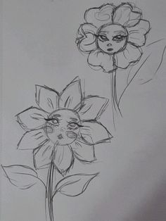 a drawing of two flowers with faces on them