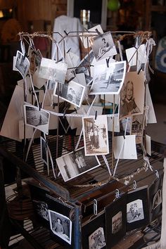 an old trunk with pictures hanging from it