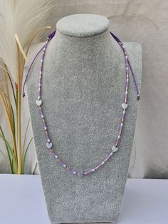 These lovely single strand beaded necklaces are great for adding a pop of colour.  Using lovely Miyuki beads as well as beautiful dyed Mother of pearl beads in the shape of a heart. The necklace is fully adjustable using a macrame double knot. When at it's smallest the necklace is approx 16 inches in circumference and at its biggest it is approx 26 inches. - This listing is for 1 necklace.  - Handmade in the UK Postage is done through Royal Mail 2nd class so no tracking available For Internation Adjustable Single Strand Lavender Beaded Necklace, Dainty Adjustable Heart Pendant Necklace, Adjustable Lavender Single Strand Beaded Necklace, Heart-shaped Bohemian Beads For Gifts, Bohemian Heart-shaped Adjustable Beaded Necklaces, Bohemian Heart-shaped Beads For Gifts, Adjustable Heart Necklace With Heart Beads And Pendant, Adjustable Heart Pendant Necklace With Heart Beads, Purple Single Strand Bohemian Beaded Necklace