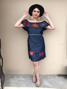 "Really modern Mexican dress, hand-embridered. Off shoulder. Fabric: Denim Loose fit Fits size Small Measurements taken flat: Armpit to armpit 21 1/2\" Width 22\" Length 34\"" Off-shoulder Embroidered Spring Dress, Floral Embroidered Off-shoulder Dress, Embroidered Fitted Denim Dress, Fitted Bohemian Denim Dress For Summer, Bohemian Denim Dress With Floral Embroidery For Spring, Bohemian Off-shoulder Dress With Floral Embroidery, Cotton Folk Dress, Fitted Off-shoulder Festival Dress, Fitted Dress For Day Of The Dead Festival