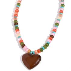 Stretched Across An Invisible Wire, Multicolored Beads, Featuring Various Opacities And Sheens, Coalesce Around The Collar. An Oversized Brown Cat's Eye Stone In A Silver Heart Frame Swings From The Bottom Of The Multicolored Display, Creating An Earthily Endearing Pendant. Features An Adjustable Clasp Closure. Sold As One Individual Necklace. Includes One Pair Of Matching Earrings. Cats Eye Stone, Brown Cat, Heart Frame, Embroidery Jewelry, Eye Stone, Paparazzi Jewelry, Silver Heart, Matching Earrings, Brown Color