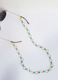 sunglass chain, Sunglass Holder, evil eye glasses chain, eyeglass chain, sunglass strap, sunglass strap, beaded strap, sunglass cord, boho Handmade eyeglass holder.  The strap is 28 inches long, if you pretend another size please let me know :)  Handmade with love :) Sunglass Strap, Glasses Chains, Beaded Strap, Glasses Strap, Sunglasses Strap, Boho Handmade, Sunglass Chain, Sunglass Holder, Eyeglass Chain