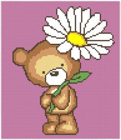 a cross stitch teddy bear holding a flower