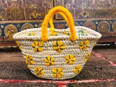 "Small round wicker French basket, hand woven in Marrakesh by friends and family. Ideal small shopper or beach bag. Also a perfect bag or gift for a girl - great for school books etc. This braided bag is perfect anytime and everywhere, Especially in the summer and there are those who like to carry them on the beach, from grocery shopping, stylish holiday accessory to home storage. It's something you won't want to leave your house without.      🌻 DETAILS 🌻 Raw Material : 100% Woven natural palm straw, wild palm doumdoum eco friendly  Trim : 100% Vegan Leather, Removable canvas pouch with a zip top closure size : 32 x 21 x 17 cm = 12.5 x 8.2 x 6.6 inches       🌻 SHIPPING 🌻 We USE FEDEX EXPRESS \"Door to Door\". for your convenience,Your order will be processed within 2-3 business days an Yellow Handwoven Straw Bag For Summer, Yellow Basket Straw Bag For Summer, Handmade Yellow Straw Bag For Summer, Handmade Yellow Summer Straw Bag, Summer Yellow Handwoven Straw Bag, Handmade Basket Straw Bag For Shopping, Traditional Straw Basket Beach Bag, Handmade Yellow Straw Summer Bag, Handmade Basket Beach Bag For Picnic