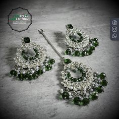 Silver Green Earrings and Mang Tikka Set Green Hand Set Tikka As A Gift, Green Hand Set Bridal Earrings As Gift, Green Hand-set Bridal Earrings As Gift, Elegant Green Tikka For Festive Occasions, Elegant Green Tikka For Festive Season, Green Bollywood Style Tikka For Festive Occasions, Green Bollywood Tikka For Festive Occasions, Elegant Green Chandbalis For Eid, Festive Green Chandbalis For Party