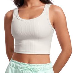 PRICES MAY VARY. Designed for yoga and daily wear. Light support. Lyocell Ribbed textured fabric is soft and smooth, 4-way stretch and premium durable. Built in bra with removable pads for support. U neck and back. Wide straps design. Camisole style for casual and stylish. Slightly thicker ribbed fabric that's breathable, stretchy & moisture-wicking. Light compression and light support. U-shaped neckline for better coverage. Camisole style, suitable for workout and outside wear.
 
 Feature & Fit Comfortable Tank Top For Workout, Comfortable Solid Color Tank Top For Workout, Versatile Yoga Crop Top, Versatile Crop Top For Yoga, Comfortable Solid Tops For Yoga, Moisture-wicking Activewear For Relaxation, Casual Solid Tank Top With Light Support, Casual Solid Sports Bra For Gym, Casual Solid Color Sports Bra For Gym