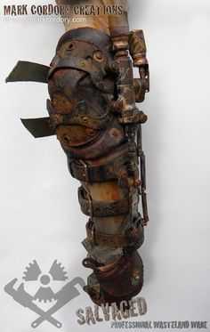 an image of a man made out of old metal parts and tools on white background