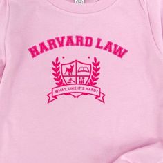 Introducing our limited edition pink tshirt, inspired by the iconic movie "Legally Blonde." This item features a bold "Harvard Law… What, Like It's Hard?" slogan in eye-catching pink ink. Channel your inner Elle Woods and showcase your wit and style with this must-have fashion statement. Embrace the empowering spirit of the film while staying cozy and fashionable in this exclusive tshirt. Legally Blonde Merch, Legally Blonde Birthday Party, Legally Blonde Harvard, Legally Blonde Party, What Like Its Hard, Legally Blonde Outfits, Harvard Logo, Blonde Shirt, Harvard Law