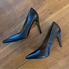 - Description: These Pumps Feature A Classic Black Color With A Pointed Toe And A Stiletto Heel, Perfect For Any Party Occasion. The Slip-On Closure Allows For Easy Wear, While The Faux Leather Material Ensures Durability And Comfort. - Condition: Excellent Condition, Like New! Tried On, Never Worn Outside. - Measurements: Size 7.5 - Always Open To Offers! Classic Medium Width Court Shoes For Party, Classic Court Shoes For Party, Classic Heels For Night Out, Medium Width, Classic Closed Toe Heels For Night Out, Black Open Toe Heels For Business, High Heel Court Shoes Medium Width For Night Out, High Heel Court Shoes For Night Out, Medium Width, Classic Closed Toe Court Shoes For Night Out, Classic Black Heels With 4-inch Heel