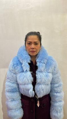 Soft, fluffy and luxurious this long sleeve faux fur jacket is cozy with a hood and has a voluminous cropped silhouette. Fully lined in black and silver-tone zip-up closure at front. Fluffy Hooded Faux Fur Outerwear, Hooded Faux Fur Coat With Fluffy Detail, Hooded Fluffy Faux Fur Coat, Fluffy Hooded Faux Fur Coat, Blue Fluffy Winter Outerwear, Fluffy Blue Outerwear For Winter, Faux Fur Hooded Coat, Roper Boots, Pink Faux Fur