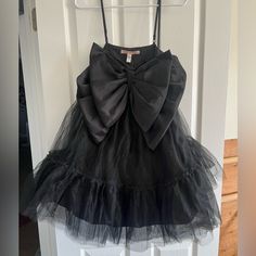 Hutch Tulle Bow Dress. Purchased For A Wedding And Then Wore Something Else. New With Tags Never Worn. Size 2 Purchased At Anthropologie Tulle Dresses With Bow, Formal Organza Dress With Bow, Evening Organza Dress With Bow, Organza Dress With Bow For Dress-up Occasions, Black Tulle Dress With Bow Detail, Black Mini Dress With Tulle Skirt, Black Tulle Dress With Bow, Black Mini Length Tulle Dress, Black Organza Mini Dress