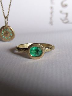 Gold Emerald Jewelry With Round Band, Oval 14k Gold Emerald Ring, Gold Emerald Ring With Bezel Setting In Oval Shape, Oval Recycled Gold Jewelry For Promise Ring, Gold Oval Emerald Ring With Bezel Setting, Oval Recycled Gold Promise Ring, Elegant Hand Forged Oval Rings, Hand Forged Elegant Oval Rings, Handmade Oval 14k Gold Jewelry