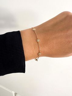 This beautiful silver Stars bracelet has an extender chain as adjusts to fit different wrist sizes. This dainty bracelet looks gorgeous stacked with other bracelets and watch. Simple, delicate and versatile... you'll want in your collection. D E T A I L S *  Available in sterling silver or Crafted in Gold plated 925 sterling silver * Very easy to put on * Adjustable from 16 to19 cm.  * An extender chain means it adjusts to fit different wrist sizes. - we use only the finest quality materials - all components are 100% sterling silver or 18k Gold plated  (Nickel free) - all pieces are designed in our happy studio  All jewelry comes in beautiful packaging, gift ready  Visit our shop www.etsy.com/shop/aranjewels Feel free to contact with us with any questions!  Like us on Facebook! https://www Silver Star Bracelet, Stars Bracelet, Watch Simple, Small Stars, Dainty Bracelet, Star Bracelet, Dainty Bracelets, Bracelet Argent, Bracelet Silver