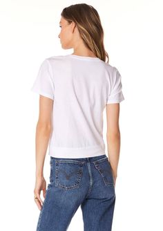 Made from 100% cotton jersey, this lightweight classic white top is breathable and effortlessly chic. Pair it with shorts or denim for a look that's both casual and elevated, perfect for warm weather. White Cotton Short-length Top, White Cotton Short Length Top, White Short Length Cotton Top, Relaxed Fit Short Tops For Day Out, Relaxed Fit Short Length Tops For Day Out, Relaxed Short Tops For Day Out, Relaxed Short Length Top For Day Out, Everyday Relaxed Fit Short Tops, Everyday Relaxed Fit Short Length Tops