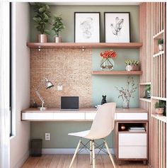 a white chair sitting in front of a desk