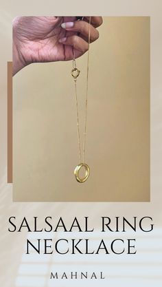 A Salsaal Major Ring sits as the centerpiece of this elegant necklace. Designed to look like an ancient treasure unearthed and found again.Sister style to the Salsaal Collection. Hallmarked Gold-plated Open Ring Jewelry, Hallmarked Brass Open Ring Jewelry, Open Ring Wedding Jewelry, Spiritual 14k Gold Jewelry For Anniversary, Silver Gold Plated Open Ring, Gold Sterling Silver Open Ring Jewelry, Metal Ring Jewelry, Timeless Clavicle Chain Pendant Jewelry, Anniversary Brass Jewelry With Open Ring